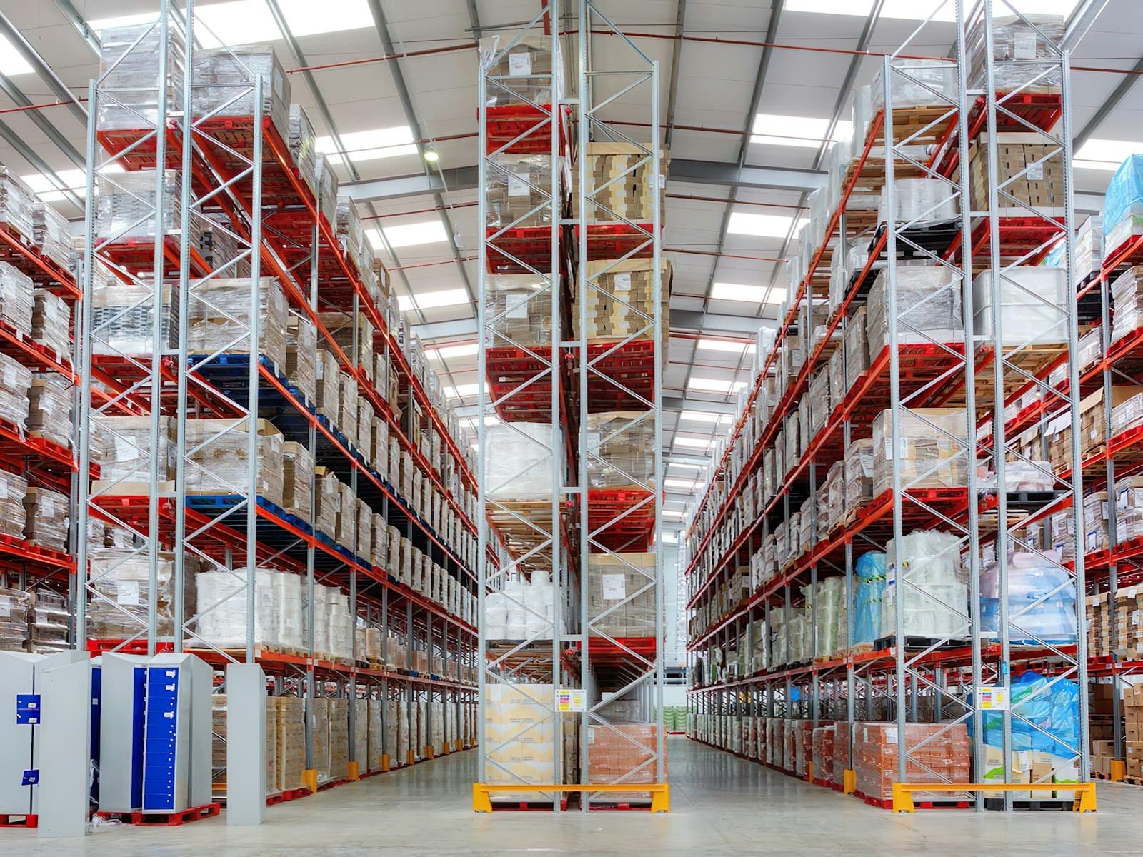 Tall shelving racks stocked with boxes in a warehouse